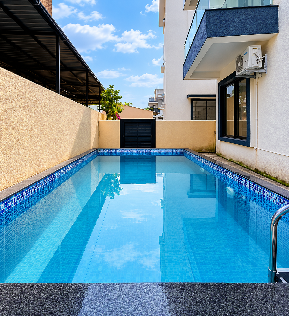 Private swimming pool at I K Galaxy villa, evening